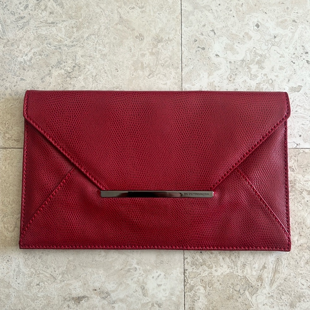 BCBG Maxazria red snakeskin clutch